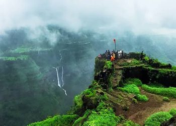 Scenic view of lush greenery and misty landscapes at a must-visit place in Lonavala during the monsoon season.