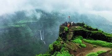 Scenic view of lush greenery and misty landscapes at a must-visit place in Lonavala during the monsoon season.