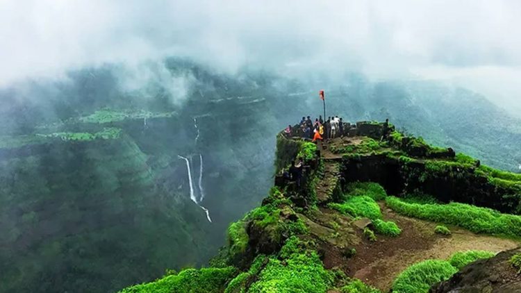 Scenic view of lush greenery and misty landscapes at a must-visit place in Lonavala during the monsoon season.