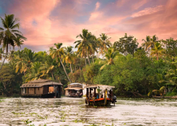 "The beauty of Alleppey captured in its serene backwaters and traditional Kerala houseboats."