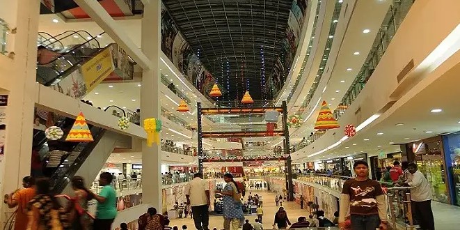 A panoramic view of Coimbatore city, known as the Manchester of South India, featuring its textile industries, lush greenery, and modern infrastructure.