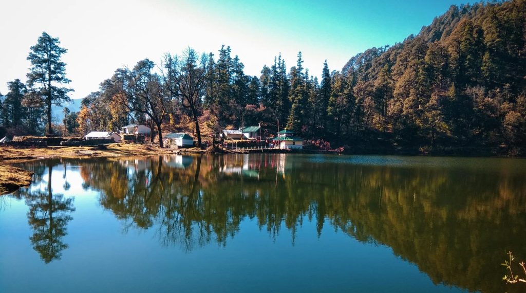 "A breathtaking view of Uttarkashi with the Bhagirathi River flowing through the Himalayas."

