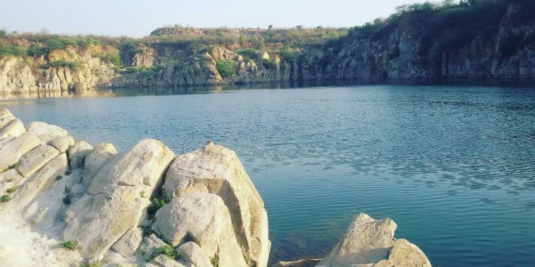 A scenic view of Faridabad showcasing its industrial skyline, cultural landmarks, and bustling street markets.