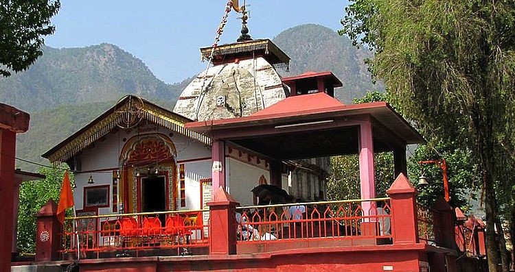 "A breathtaking view of Uttarkashi with the Bhagirathi River flowing through the Himalayas."

