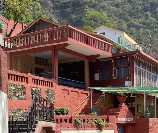 "A breathtaking view of Uttarkashi with the Bhagirathi River flowing through the Himalayas."

