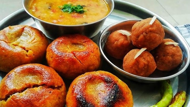 "Maihar: The Hidden Gem – Traditional Dal Bafla meal served in a rustic setting"