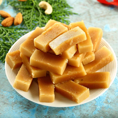 Exploring the Garden City: Delicious Mysore Pak sweets displayed at a Bengaluru sweet shop