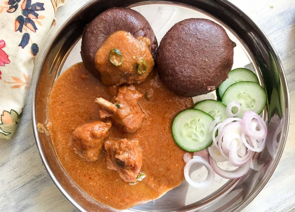 Exploring the Garden City: Freshly made Ragi Mudde served with spicy curry in Bengaluru