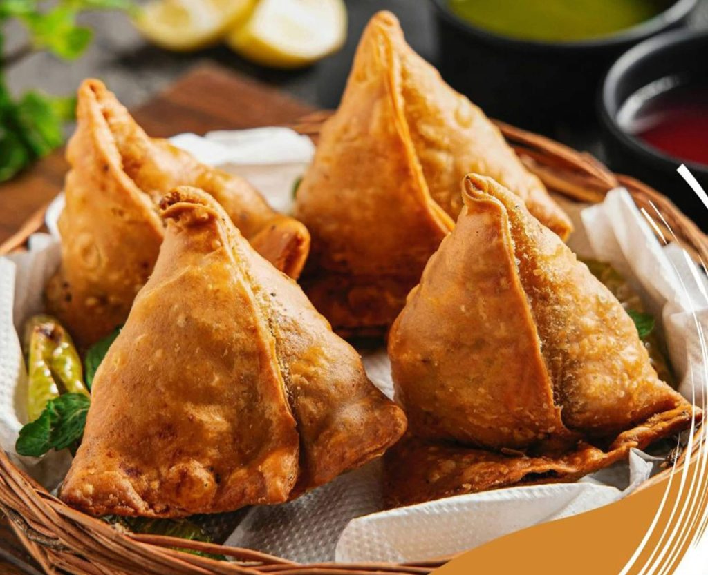 "Maihar: The Hidden Gem – Hot samosas served with chutney at a roadside tea stall in Maihar"