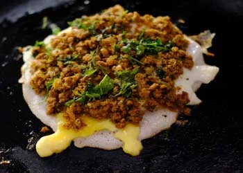 Pollachi – Gateway to Kongu Nadu cuisine, with traditional dishes like Kari Dosa and Kambu Koozh served on banana leaves in rustic settings.